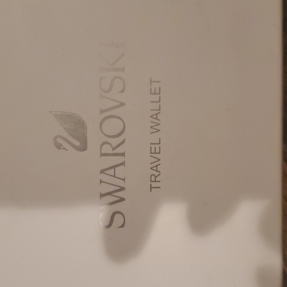 Swarsowski travel wallet new in box creme  wristlet comes off carries all boxed - Picture 9 of 9